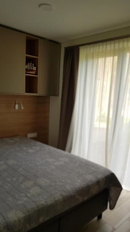 Апартаменты Pervalkos Smilgos apartamentai Первалка-31